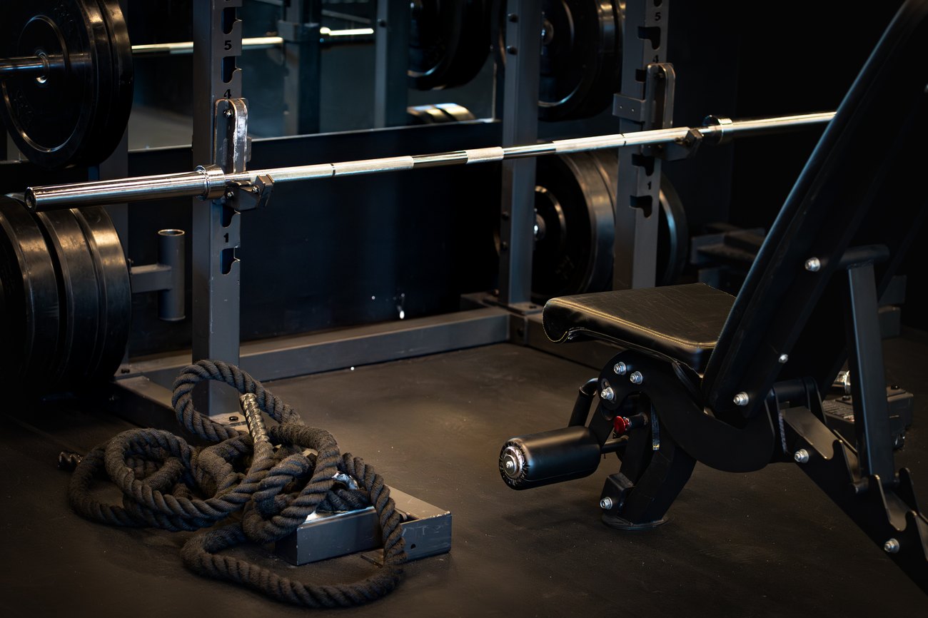 Power racks and Olympic barbells at Fitness Covered